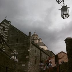 Low angle view of bell tower against sky