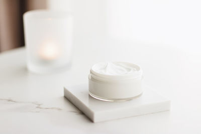 Close-up of moisturizer on white background