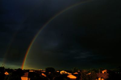 Rainbow over city