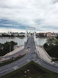 High angle view of road by city against sky