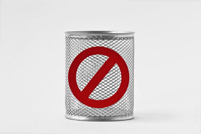 Close-up of telephone booth against white background