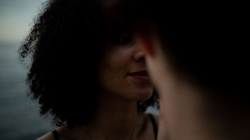 Close-up of young woman standing outdoors