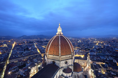 High angle view of illuminated buildings in city