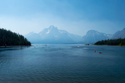 Scenic view of lake against blue sky