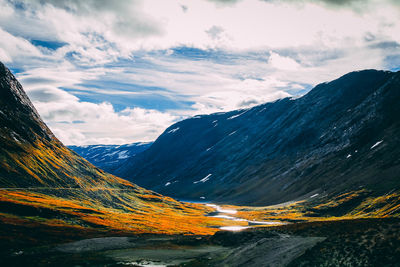 Scenic view of snowcapped mountains against sky