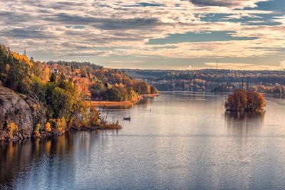 Scenic view of lake against sky during autumn