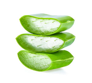 Close-up of green leaf against white background