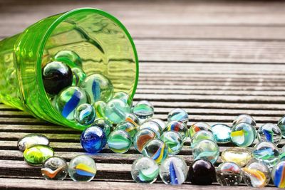 Close-up of multi colored objects on table