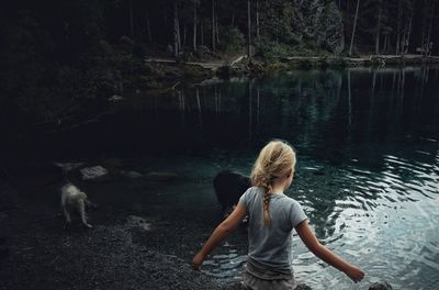 Rear view of girl in lake