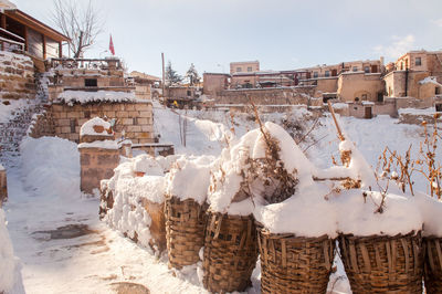 Panoramic view of buildings against sky during winter