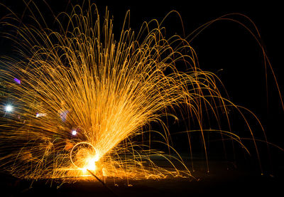 Firework display at night