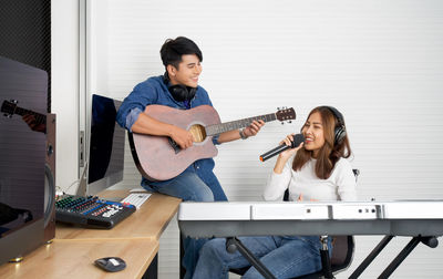 Young man playing guitar