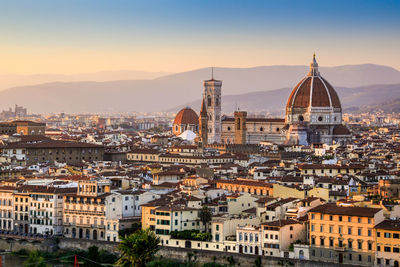 Florence in the orange glow of dusk
