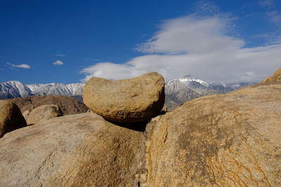 View of rocks on mountain against sky