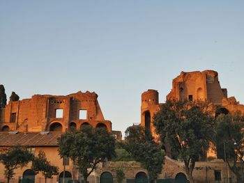 Old ruin buildings against clear sky