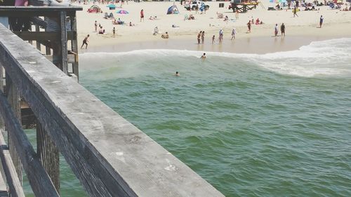 High angle view of people enjoying in water