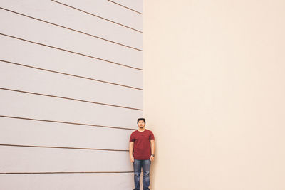 Full length of woman standing on floor