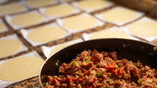 Woman making patty