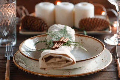 Close-up of napkin in plate on table