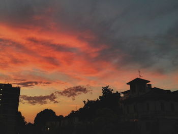 Low angle view of dramatic sky at sunset