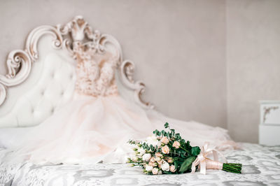 Close-up of wedding rings on table