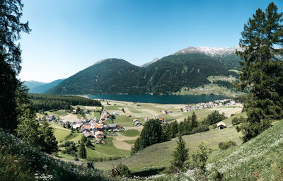 Scenic view of landscape and mountains against sky