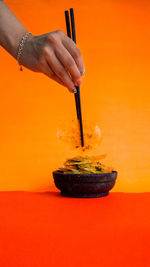 Close-up of hand holding ice cream