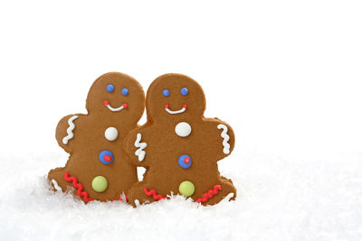 Close-up of cookies against white background