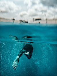 Man swimming in sea