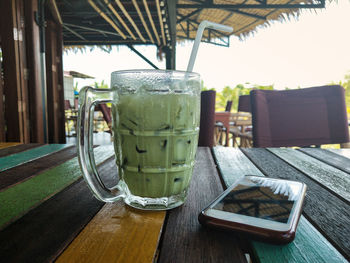 Close-up of beer glass on table at restaurant