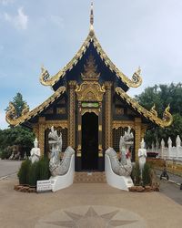 Exterior of temple against building