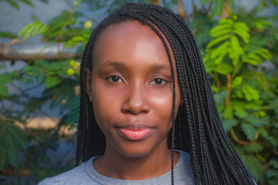 Close-up portrait of a smiling young woman