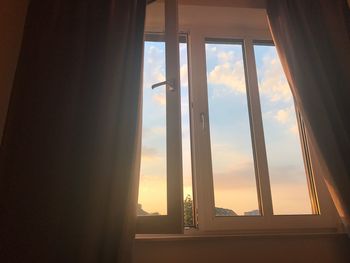 Close-up of window at sunset