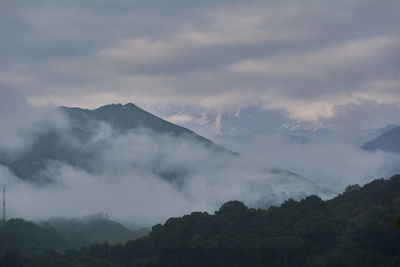 High mountains full of fog and clouds, colors of nature