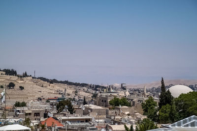 High angle shot of townscape against clear sky