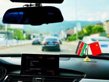 Small flags on car dashboard