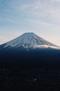 Scenic view of snowcapped mountain against sky