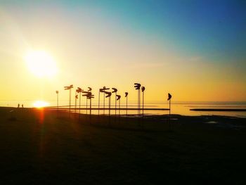Scenic view of sea against clear sky during sunset