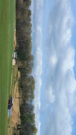 Scenic view of landscape against cloudy sky