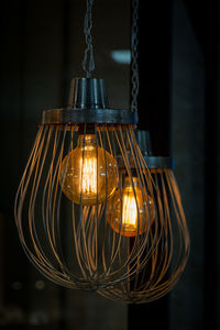 Close-up of illuminated light bulb