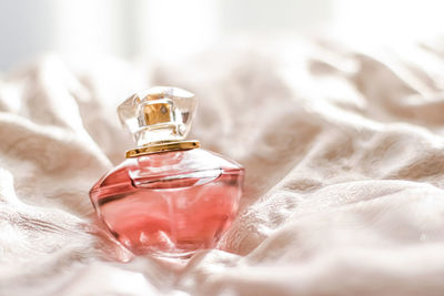 Close-up of glass bottle on table