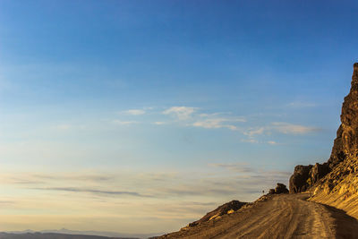 Panoramic view of rocks against sky