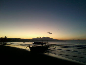 Scenic view of sea at sunset