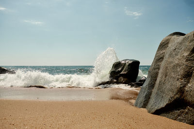 View of waves breaking on beach