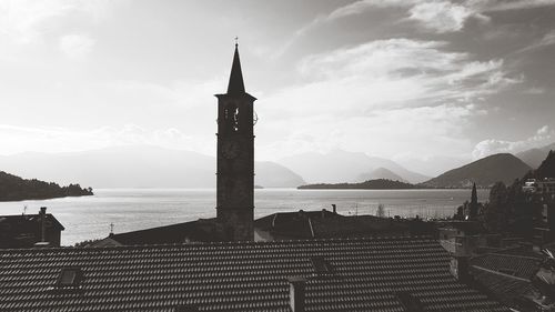 Scenic view of sea and buildings against sky