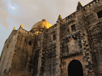 Low angle view of old building against sky