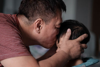 Close-up portrait of friends at home