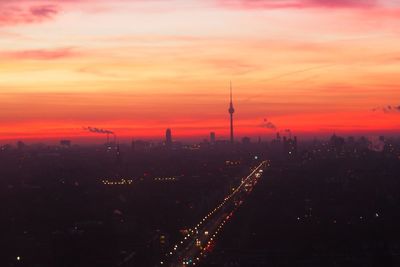 Aerial view of city during sunset