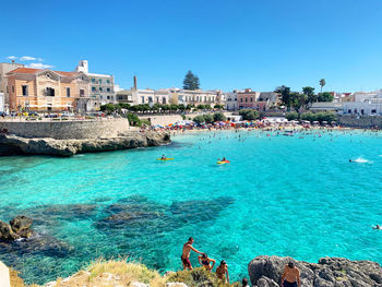 Panoramic view of beach against blue sky