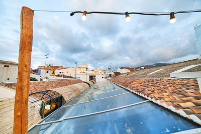 Buildings in city against sky